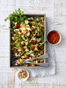 Roast Jersey Royal New Potatoes with feta, harissa yogurt and toasted almonds v1